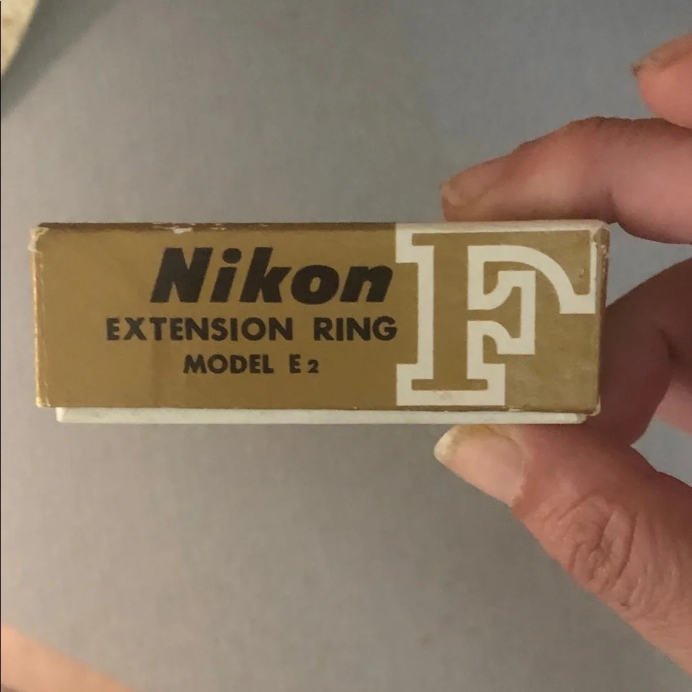 Nikon Extension Ring Box in Gold and White